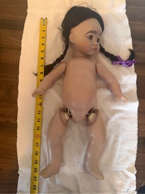 Porcelain Doll with beautiful Inuit Parka and Mukluks Included!